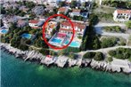 Seaside family friendly house with a swimming pool Seget Vranjica