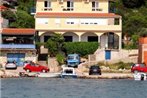 Apartments by the sea Tisno