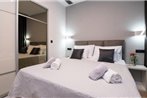 Sky & Sun Luxury Rooms with private parking in the garage