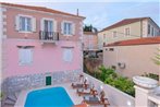 Seaside apartments with a swimming pool Jelsa