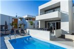 Apartments with a swimming pool Novalja