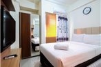 Studio Green Pramuka City Apartment with Mall Access By Travelio