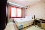 Modern 2BR at City Home Apartment with Sofa Bed near MOI By Travelio