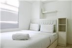 Modern White 2BR Kalibata City Apartment By Travelio