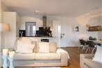 Modern apartment with a view of the Scheveningen harbor