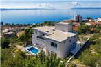 Family friendly apartments with a swimming pool Podgora