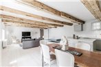 Aesthetic Luxury Apartment With Exposed Ceiling Beams