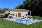 Scenic holiday home in Biron with private swimming pool